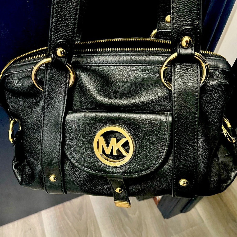 Michael Kors purse with front snap for extra storage